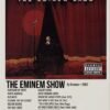The Eminem Show 2002 poster featuring Eminem standing between red stage curtains with a microphone.