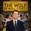 The Wolf of Wall Street Movie Poster The Wolf of Wall Street poster featuring a man in a black suit standing in front of a cheering crowd with falling confetti.